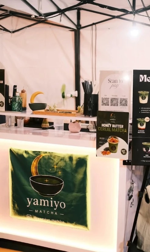 The Yamiyo Matcha counter, menu board and signage